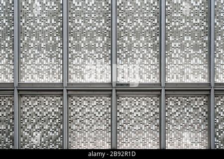 Facade Silver Glass Panels with Grey Color Frames. Reflecting and Metallic Gradient Texture. Stock Photo