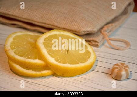 Close up of lemon slices, hessian bag Stock Photo