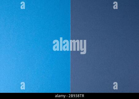 Light blue and dark blue paper background, copy space. Stock Photo