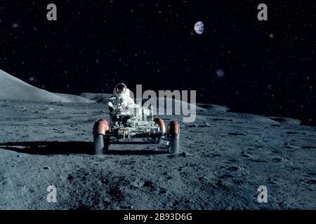 Astronaut near the moon rover on the moon. With land on the horizon. Elements of this image were furnished by NASA. Stock Photo