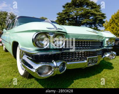 Close up of the front of a classic 1959 Cadillac coupe de Ville with its highly decorated radiator grille Stock Photo