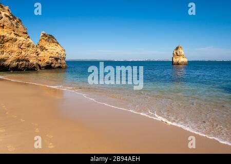 Empty beach at Praia do Camilo, Lagos, Portugal Stock Photo