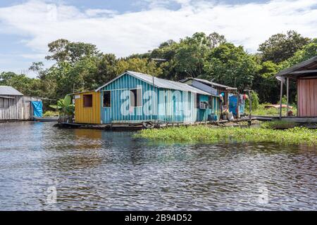 floating houses on the Amazon river in the city of Manaus in Brazil Stock Photo