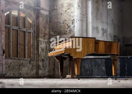 A piano in an lost place Stock Photo