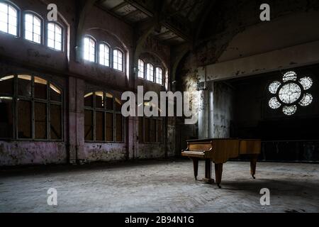 A piano in an lost place Stock Photo