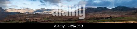 A five image panorama of the Lake District Southern Fells, with Harter Fell right of centre and Scafell on the left, Cumbria, England. 29 January 2007 Stock Photo