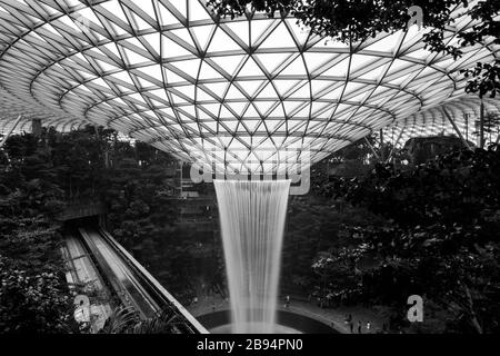 Jewel Changi Airport, Singapore. Jewel Changi Airport is a nature-themed entertainment and retail complex on the landside of Changi Airport. Stock Photo