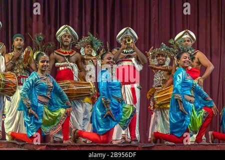 The famous Kandy Dancers in their  colourful traditional costumes during a performance in Kandy, Sri Lanka. Stock Photo