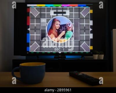 UK, March 2020: TV Television test card BBC girl with chalk board Stock Photo