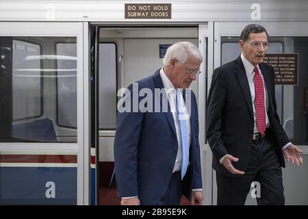 Washington, United States. 23rd Mar, 2020. Senator Roger Wicker (D-MS) and Senator John Barrasso (R-WY) heads to the senate floor to vote on Capitol Hill in Washington, DC on Monday, March 23, 2020. Photo by Tasos Katopodis/UPI Credit: UPI/Alamy Live News Stock Photo