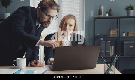 Two business people discussing issues Stock Photo