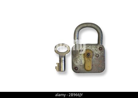 rusty old padlock with key, close up, isolated on white background Stock Photo