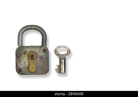 rusty old padlock with key, close up, isolated on white background Stock Photo