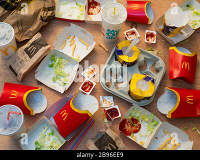 Empty McDonald's Take Away Food Packaging, McDonald's is a fast food restaurant chain founded in 1940. Stock Photo