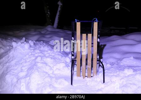 Abstract sled on snow lighted in night Stock Photo