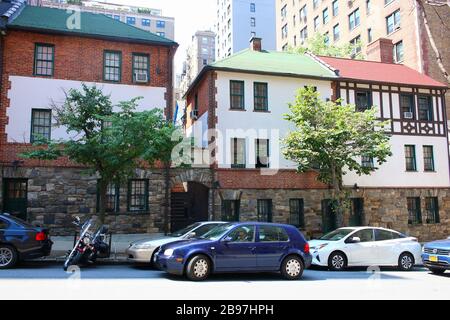 Pomander Walk is a cooperative apartment complex located on the Upper West Side, Manhattan on JULY 25th, 2019 in New York, USA. (Photo by Wojciech Mig Stock Photo