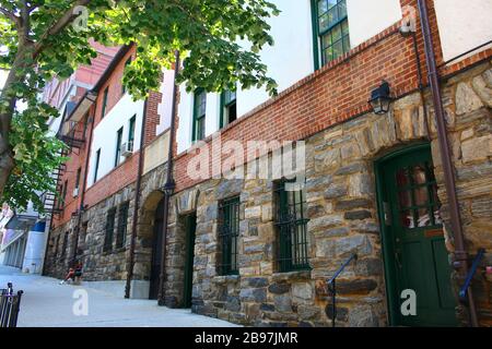 Pomander Walk is a cooperative apartment complex located on the Upper West Side, Manhattan on JULY 25th, 2019 in New York, USA. (Photo by Wojciech Mig Stock Photo