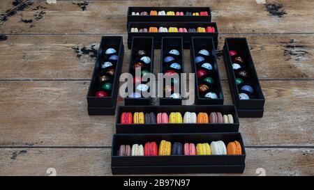 macarones pack on wooden table background Stock Photo