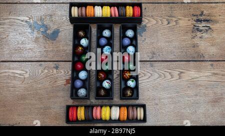 macarones pack on wooden table background Stock Photo