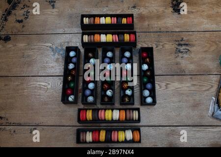 macarones pack on wooden table background Stock Photo