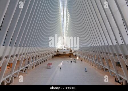 Very few passengers in the World Trade Center Oculus in New York City because of COVID-19, Coronavirus. Stock Photo