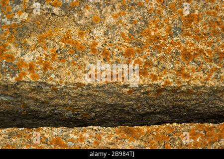 Split in red moss stone Stock Photo