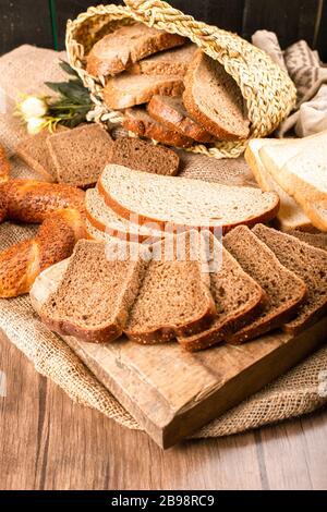 Slices of dark and white bread in box with tasty turkish bagels Stock Photo