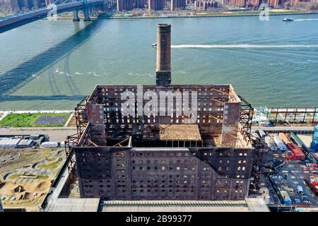 Brooklyn, New York - Feb 17, 2020: Former Domino Sugar Factory as viewed from the Williamsburg neighborhood of Brooklyn, New York. Stock Photo