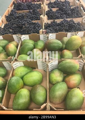 Boxes with vegetables and fruits on shelves of supermarket, sale Stock ...