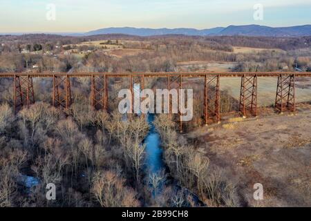 Moodna Viaduct Trestle. The Moodna Viaduct is an iron railroad trestle spanning Moodna Creek and its valley at the north end of Schunemunk Mountain in Stock Photo