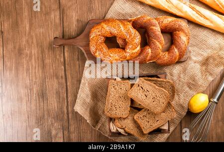 French baguette with turkish bagels and slices of bread in box Stock Photo
