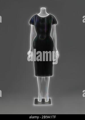 Dress and Jacket (complet) Black wool frock with short sleeves, wrap to the left with double row of black buttons, pencil skirt and narrow belt, Black wool frock with short sleeves, turn to the left with double row of black buttons, pencil skirt and narrow belt. Model: Round neck, short sleeves, pencil skirt. Narrow belt that runs from the side seams to the back and closes with a button at the back. Counterfeit wrap to the left over the bodice. Three darts on either side. Transhipment runs down the waistline down the middle, the waistline follows this line. Closure at the center back by means Stock Photo