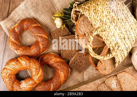 Slices of dark and white bread in box with tasty turkish bagels Stock Photo