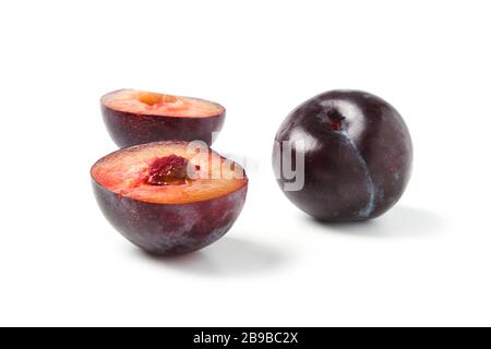 Black ripe plums isolated on white background Stock Photo