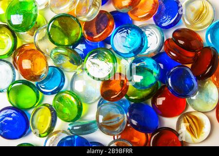 Background formed by a wall made of colored glass stones Stock Photo