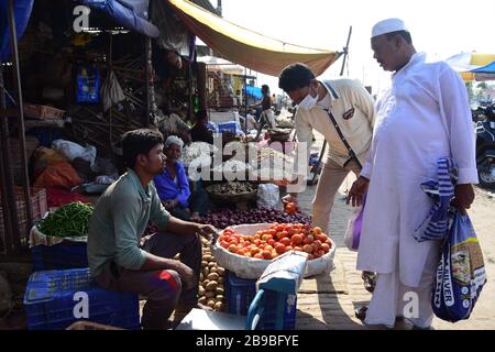 Prayagraj, Uttar Pradesh, India. 24th Mar, 2020. Prayagraj: People buying vegetable during lockdown in the wake of Coronavirus outbreak in Prayagraj on Tuesday, March 24, 2020. (Credit Image: © Prabhat Kumar VermaZUMA Wire) Stock Photo