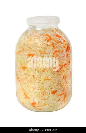 Sauerkraut with carrot in a glass jar with a plastic lid. Russian national cuisine Stock Photo