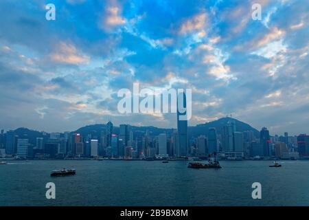 Hong Kong skyline with clouds at sunset Stock Photo