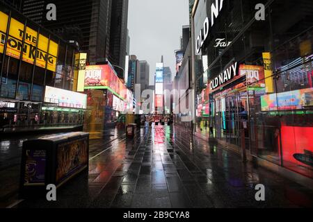 New York, USA. 23rd Mar, 2020. Photo taken on March 23, 2020 shows the empty Times Square in New York, the United States. The number of confirmed COVID-19 cases in New York City has reached 13,119 as of Monday night local time, according to data of the Center for Systems Science and Engineering (CSSE) at Johns Hopkins University. A total of 124 deaths have been reported in the city, according to the CSSE. The largest U.S. city with a population of 8.6 million has become a new epicenter of the outbreak, taking about 30 percent of the nation's tally of 43,901. Credit: Xinhua/Alamy Live News Stock Photo