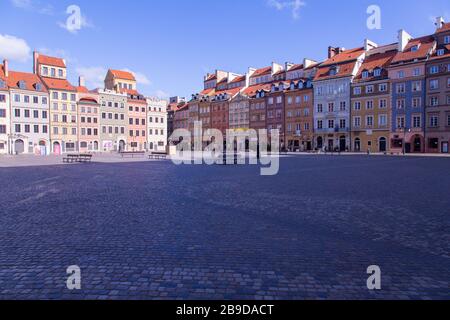 Empty deserted Warsaw's Old Town Market Place in the city Centre of Warsaw, Poland during coronavirus pandemic Stock Photo