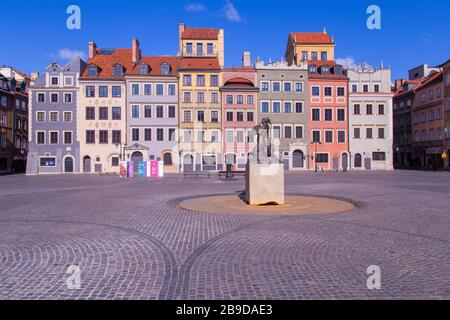 Empty deserted Warsaw's Old Town Market Place in the city Centre of Warsaw, Poland during coronavirus pandemic Stock Photo