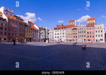 Empty deserted Warsaw's Old Town Market Place in the city Centre of Warsaw, Poland during coronavirus pandemic Stock Photo