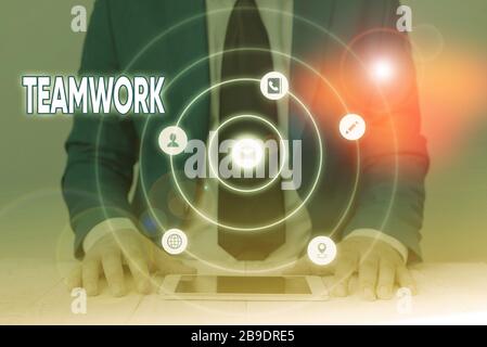 Handwriting text writing Teamwork. Conceptual photo combined action of group especially when effective and efficient Stock Photo