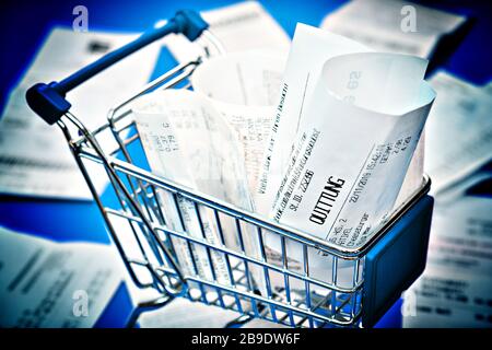 Receipts in a shopping cart, receipt duty, Kassenbons in einem Einkaufswagen, Kassenbonpflicht Stock Photo
