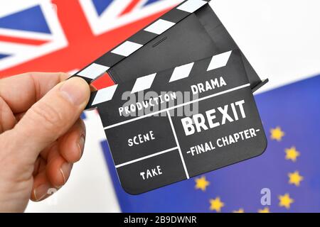 PHOTOMONTAGE, film flap with Brexit stroke, British flag and EU flag, FOTOMONTAGE, Filmklappe mit Brexit-Schriftzug, britische Flagge und EU-Fahne Stock Photo