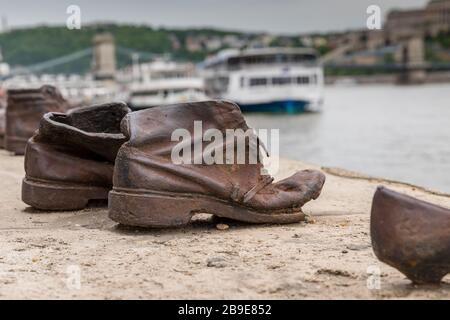 Shoes symbolizing the massacre of people shot at the river Danube in Budapest, Hungary. Travel. Stock Photo