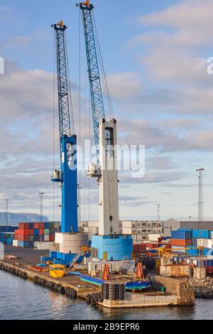 Comercial harbor with cranes and containers in Torshavn, Faroe islands Stock Photo