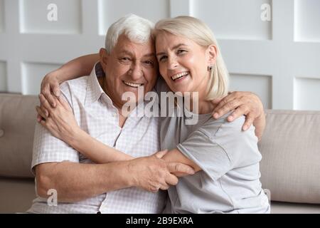 Head shot portrait older wife and husband with healthy smiles Stock Photo