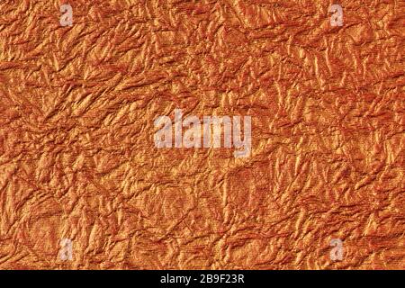 Bronze colored interesting paper structures, abstract background. Germany Stock Photo