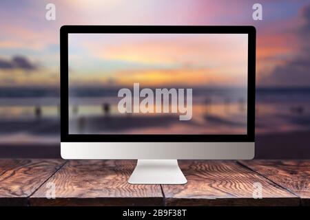 Computer screen with blurred sea background. Stock Photo